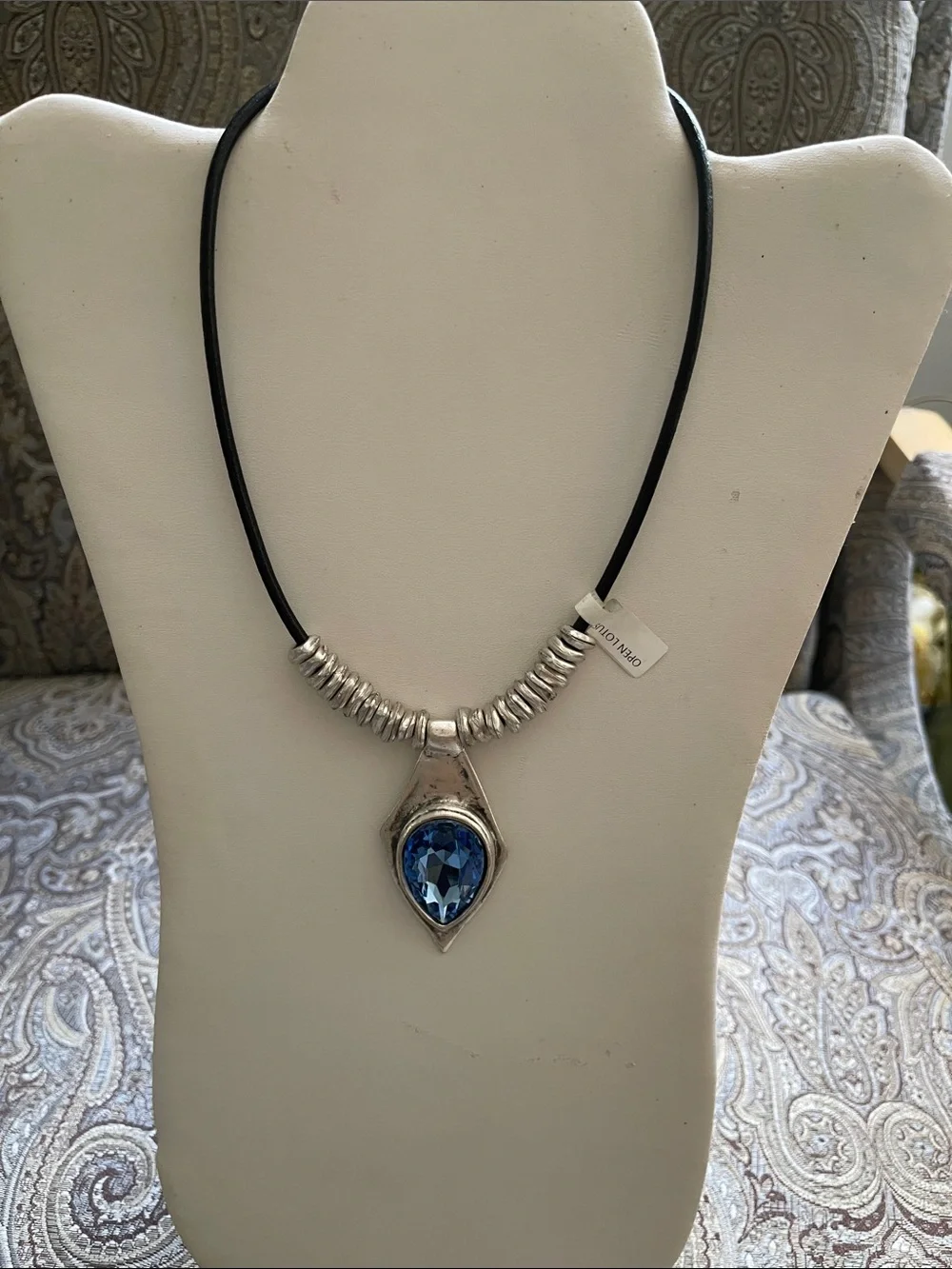 Silver-Plated Necklace with Blue Teardrop Pendant on Black Cord